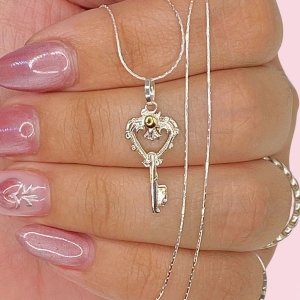 Cadena Forcet redondo de Plata 925 y Dije llave de tesoros Plata y Oro